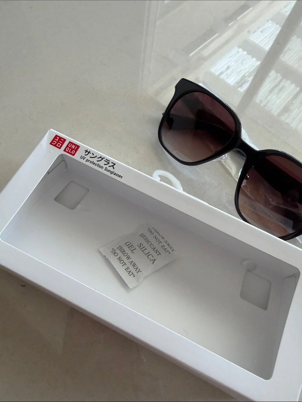 Uniqlo Black Frame UV protection Sunglasses with brown lens